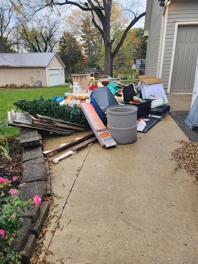 Dumpster being loaded with debris for Commercial Dumpster Rental in Castaic